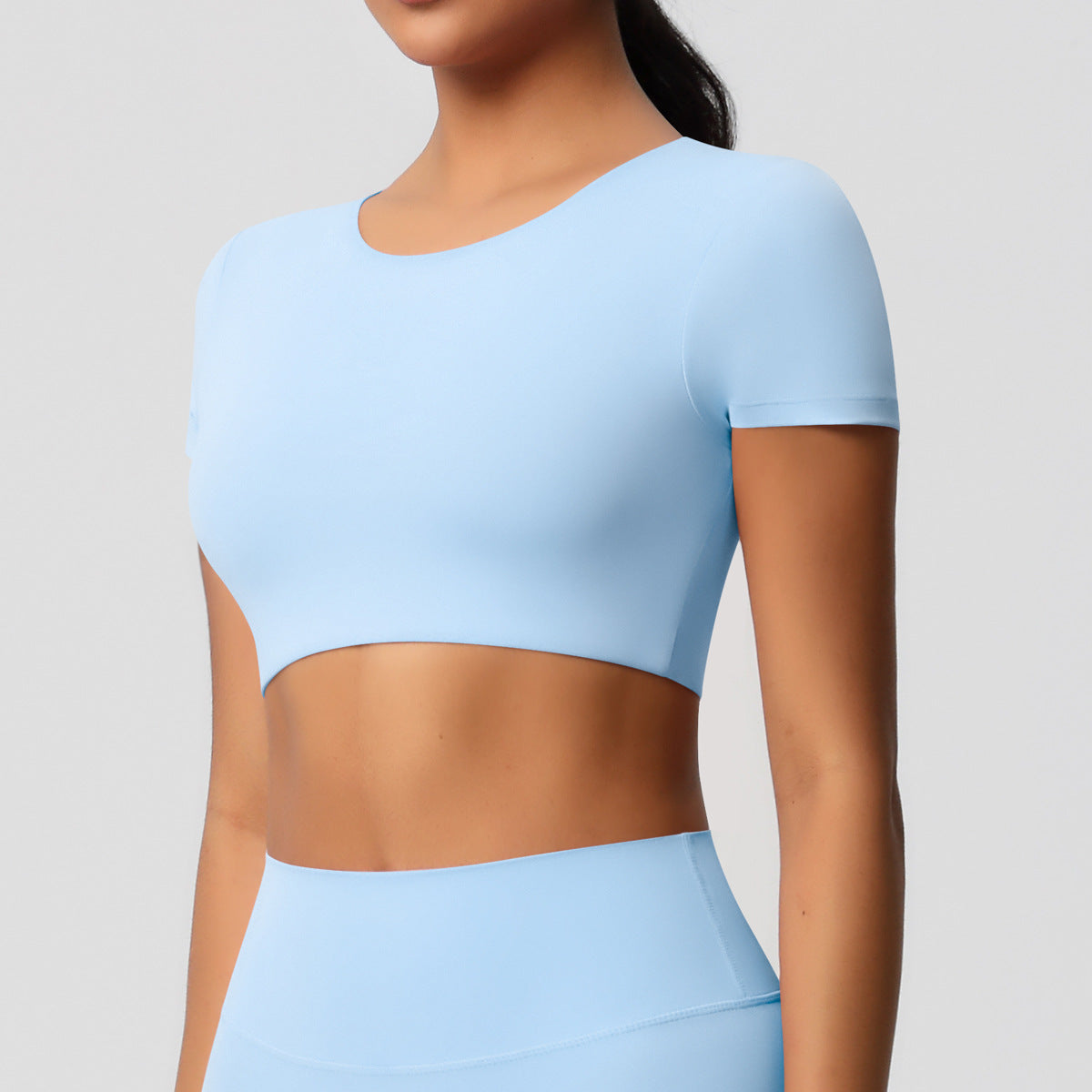 Cross-border European and American yoga pants solid color long-sleeved skin-friendly and breathable back sports short-sleeved slim and thin fitness pants set