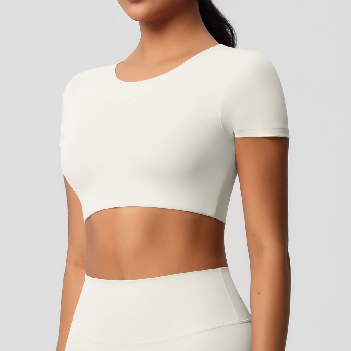 Cross-border European and American yoga pants solid color long-sleeved skin-friendly and breathable back sports short-sleeved slim and thin fitness pants set