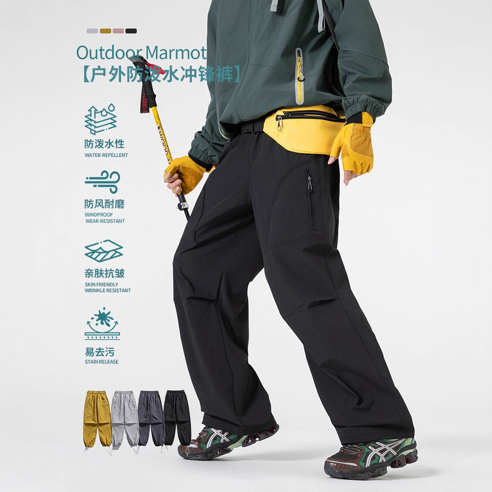 IZEXX tide brand outdoor mountaineering three-proof water-splashing quick-drying sports fleece charge pants men's and women's functional wind overalls